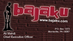 Bajaku business card with the wordmark and character silhouette over a brick texture